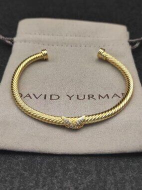 David Yurman's bracelet with a cross motif